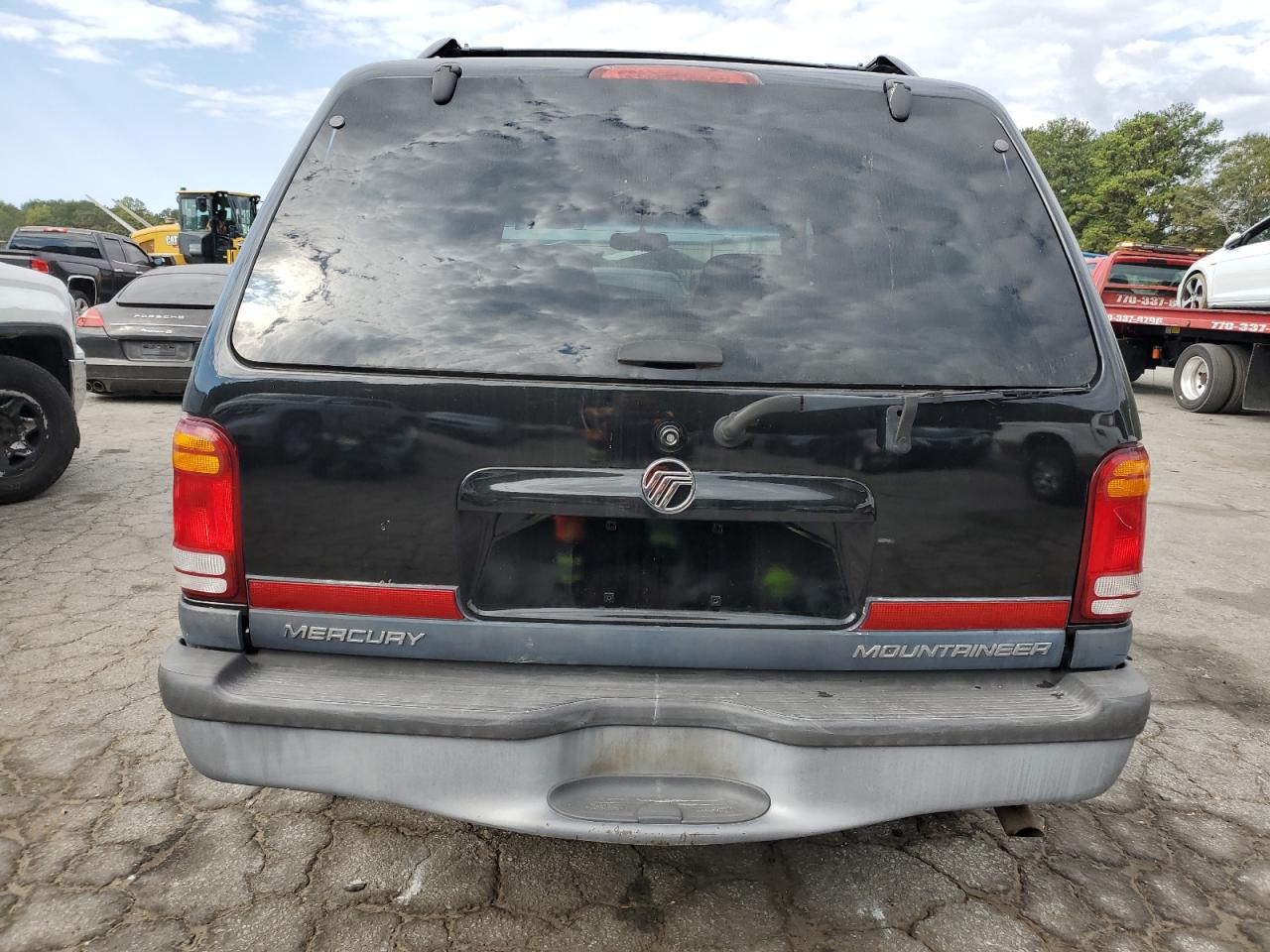 1999 Mercury Mountaineer VIN: 4M2DU52P9XUJ10152 Lot: 76283584