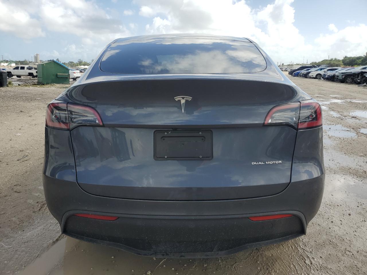 2023 Tesla Model Y VIN: 7SAYGAEE6PF627048 Lot: 77039574