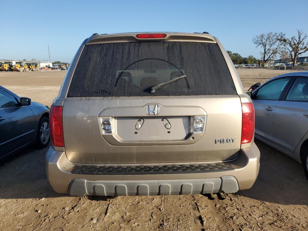 2005 Honda Pilot Exl VIN: 2HKYF18605H563060 Lot: 77610014