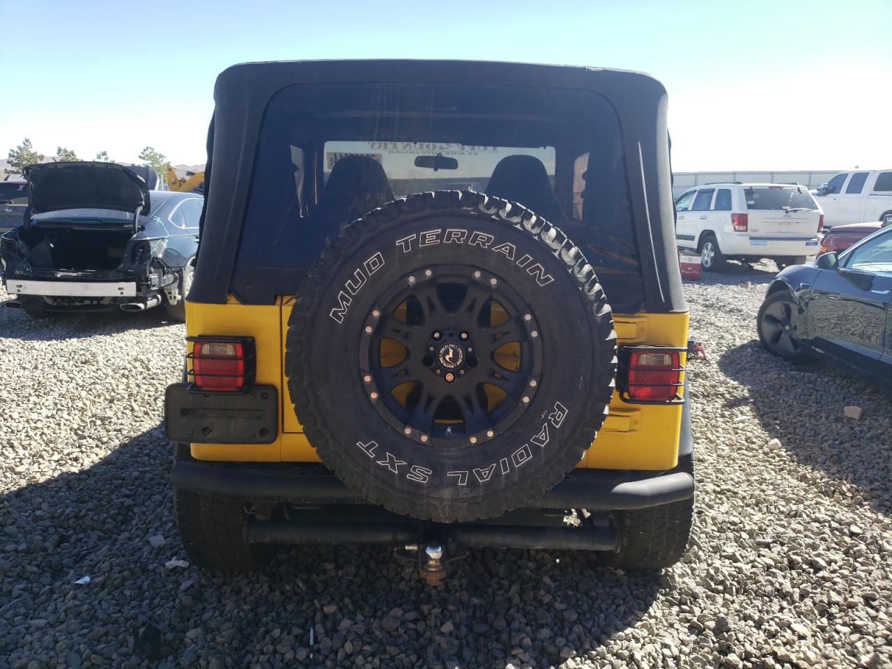 2002 Jeep Wrangler / Tj Sport VIN: 1J4FA49S02P709518 Lot: 73567614