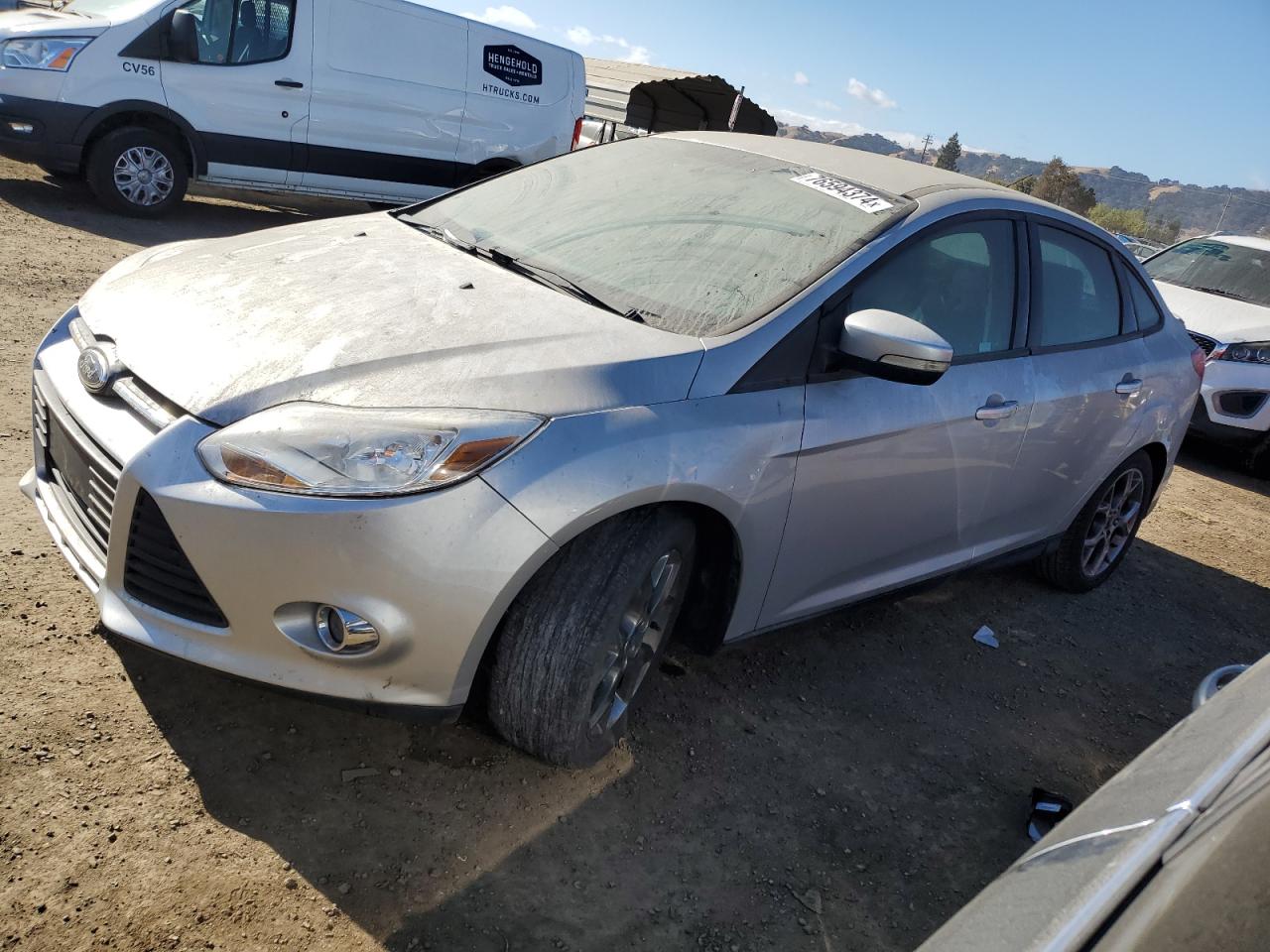 VIN 1FADP3F22EL399724 2014 FORD FOCUS no.1