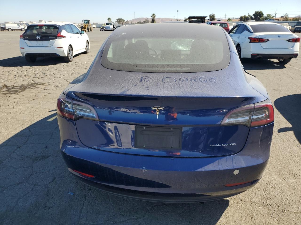 2019 Tesla Model 3 VIN: 5YJ3E1EB1KF390058 Lot: 76039104