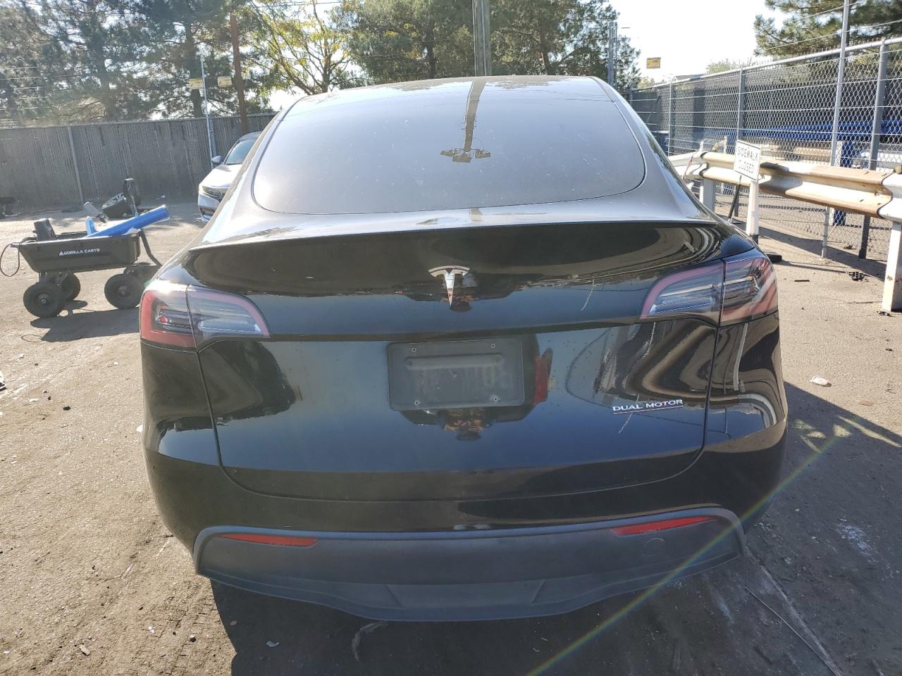 2023 Tesla Model Y VIN: 7SAYGDEF5PF610915 Lot: 76420214