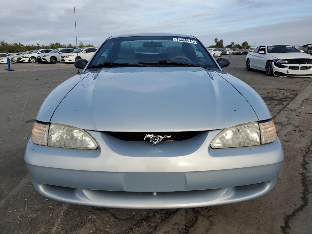 1996 Ford Mustang VIN: 1FALP4047TF106715 Lot: 78658044