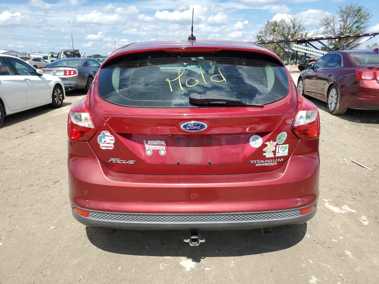 2014 Ford Focus Titanium VIN: 1FADP3N23EL359458 Lot: 74261164