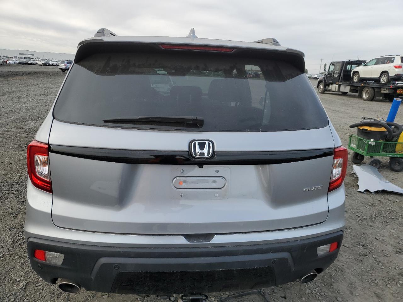 2021 Honda Passport Elite VIN: 5FNYF8H03MB021114 Lot: 77655654