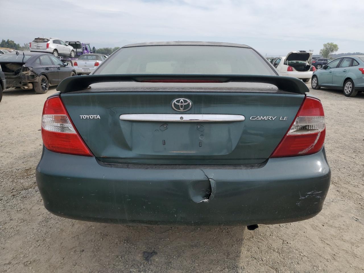 2002 Toyota Camry Le VIN: JTDBE32K820065269 Lot: 73583644