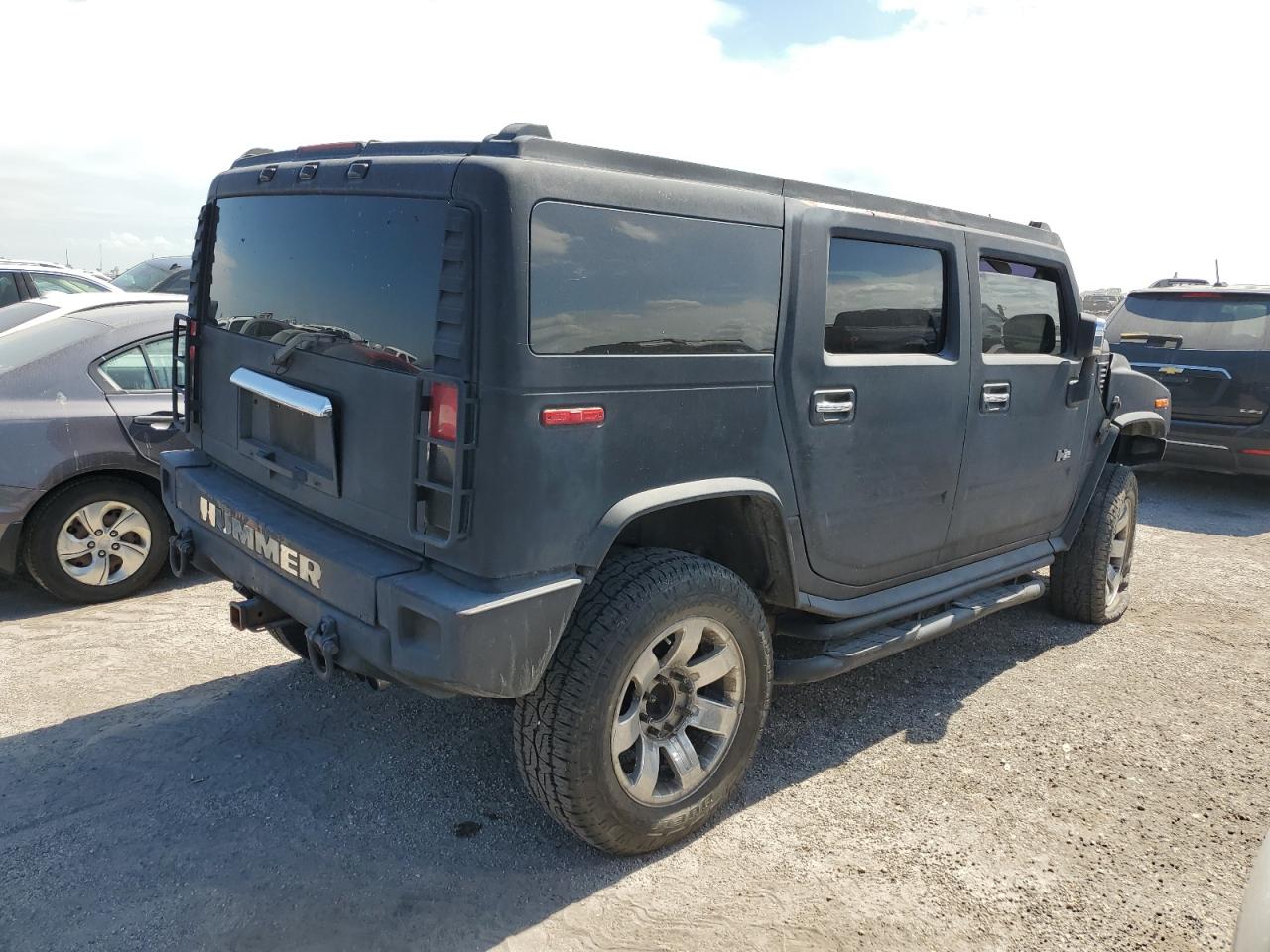 2003 Hummer H2 VIN: 5GRGN23U13H143781 Lot: 74318724