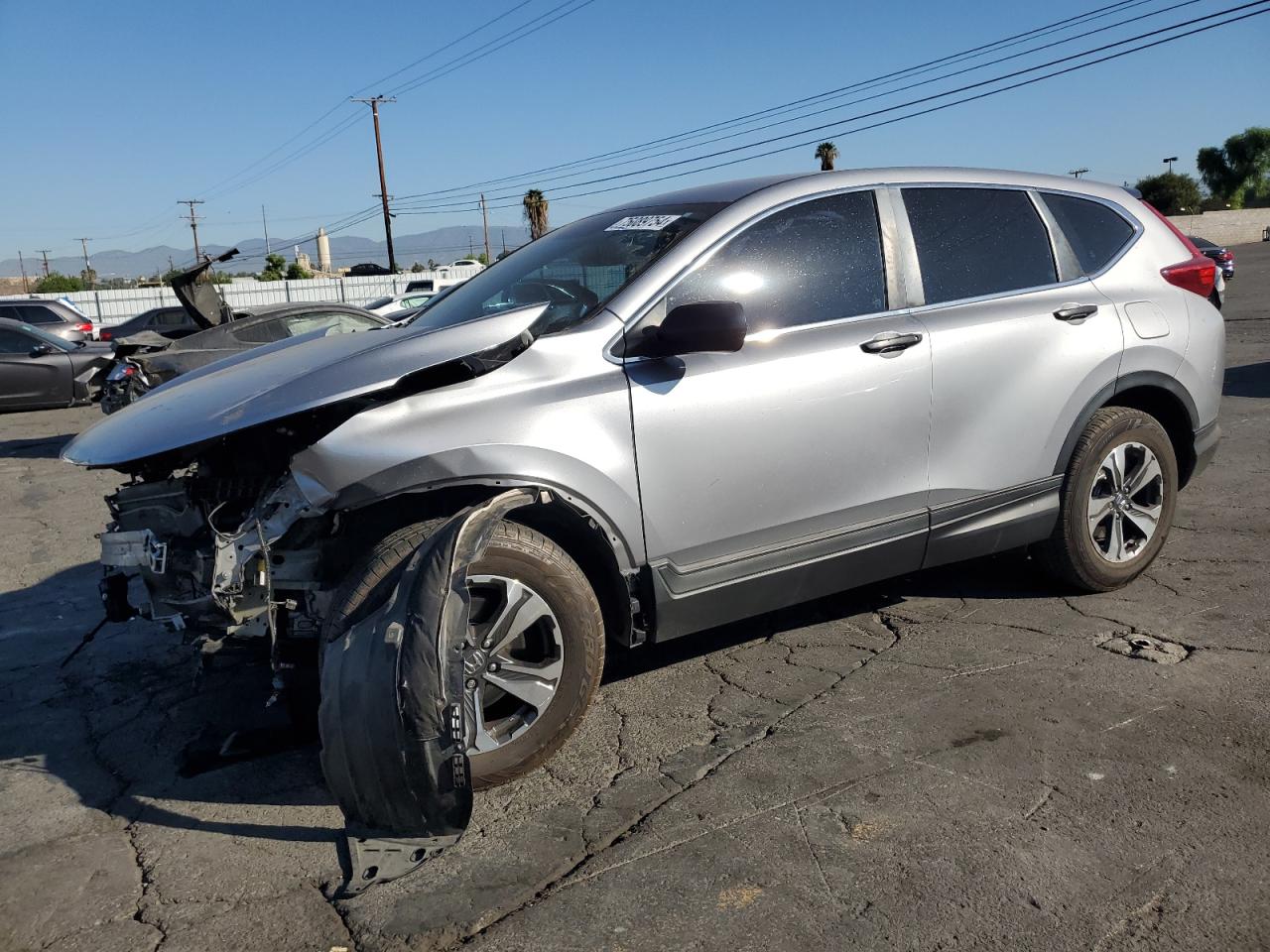 2018 Honda Cr-V Lx VIN: 2HKRW5H39JH409376 Lot: 75089754