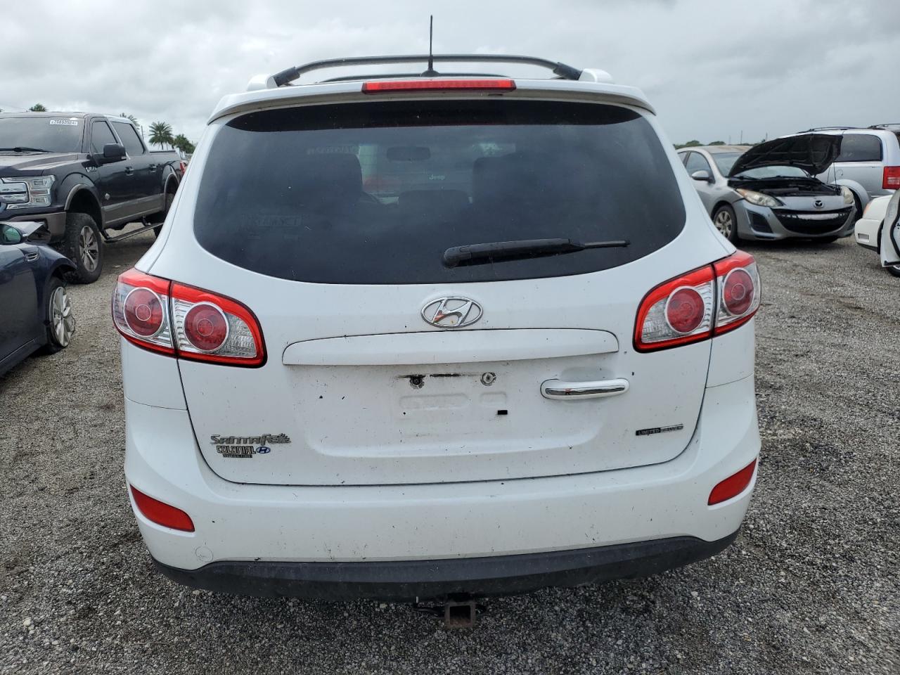 2012 Hyundai Santa Fe Limited VIN: 5XYZKDAG1CG143185 Lot: 74531934