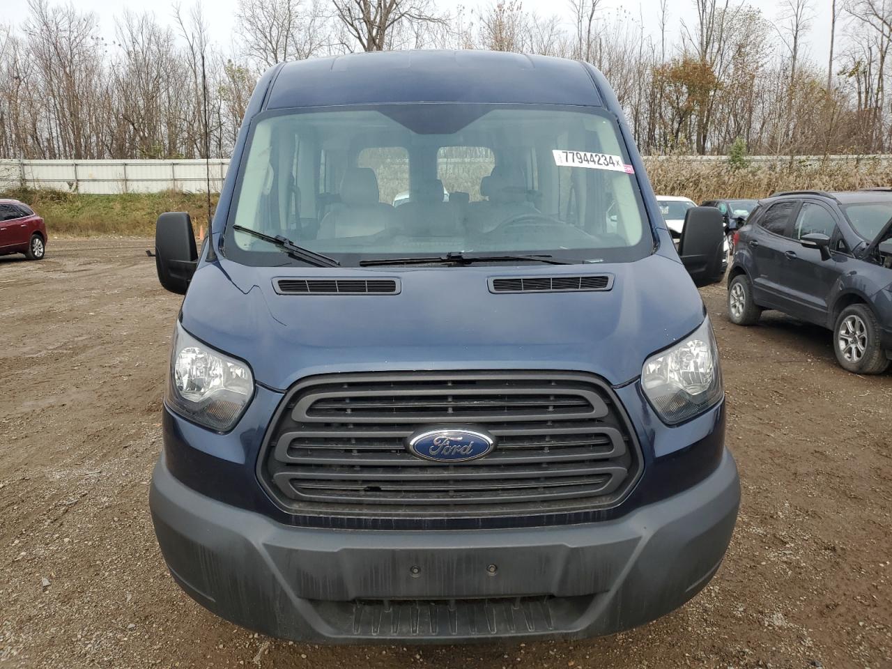 2015 Ford Transit T-150 VIN: 1FMZK1CM2FKB31879 Lot: 77944234