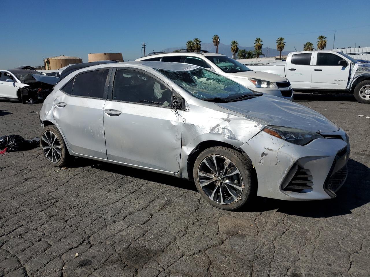 VIN 5YFBURHE4HP609241 2017 TOYOTA COROLLA no.4