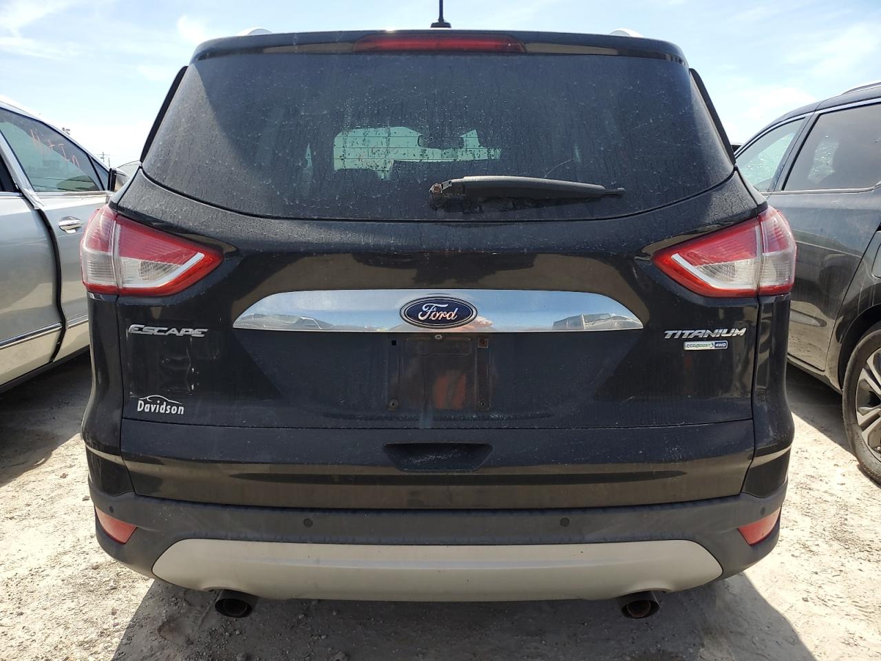 2014 Ford Escape Titanium VIN: 1FMCU9J90EUE32599 Lot: 74937564