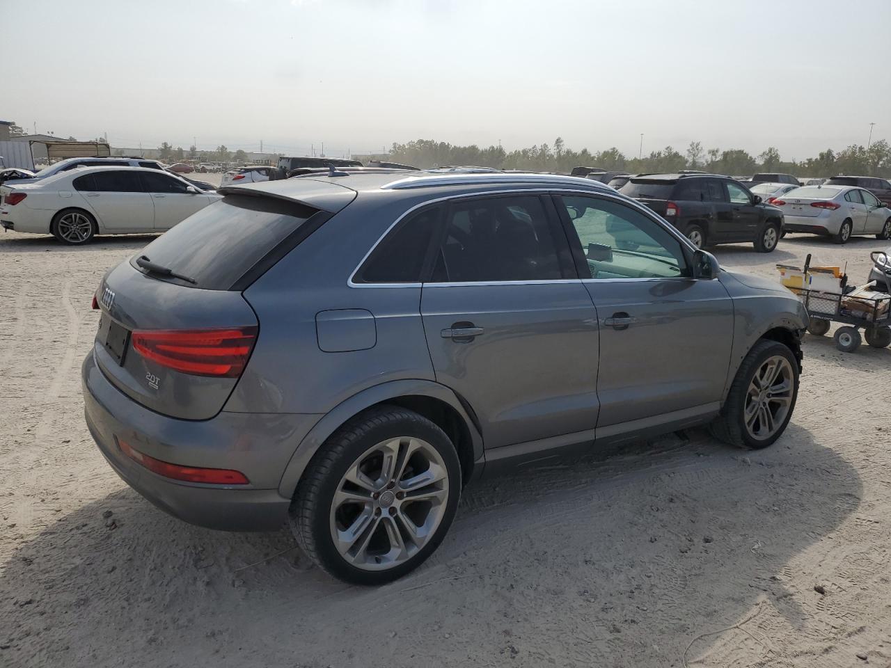 2015 Audi Q3 Premium Plus VIN: WA1EFCFS4FR004369 Lot: 74673574