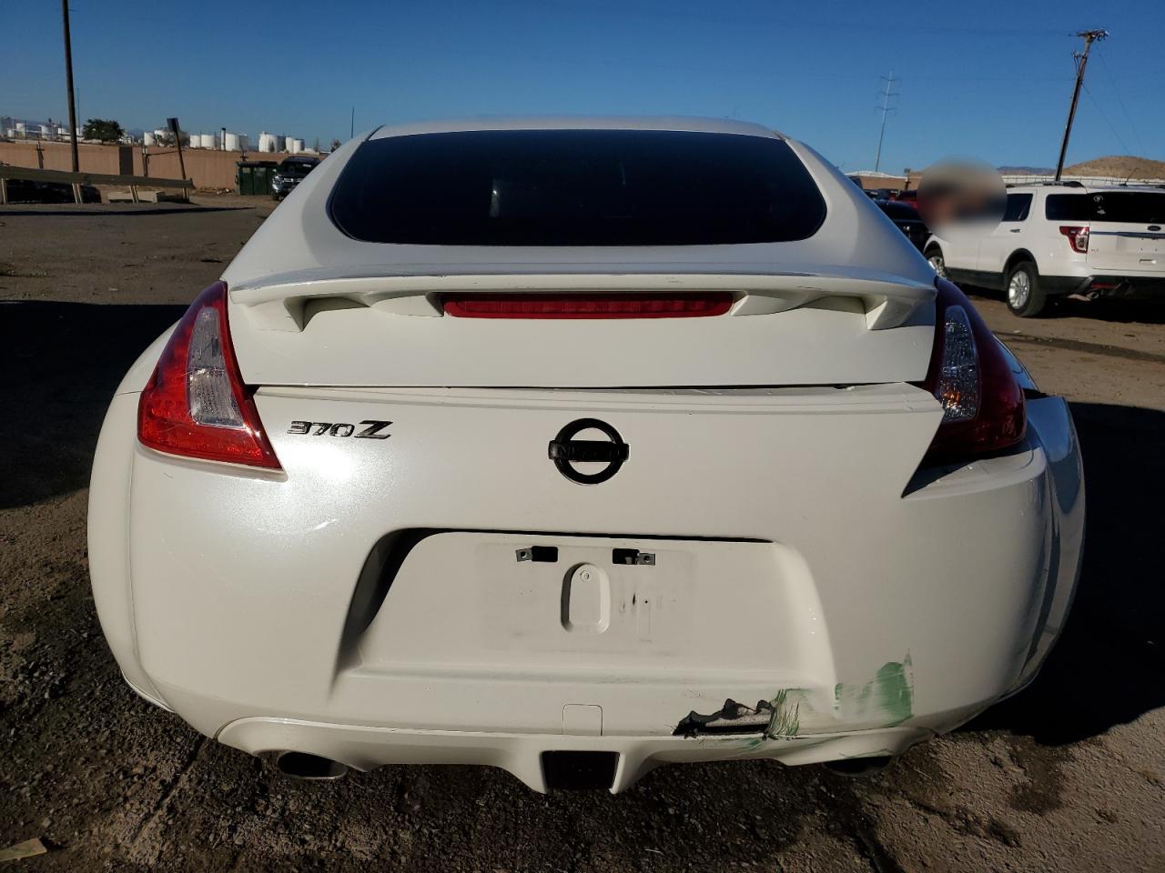 2009 Nissan 370Z VIN: JN1AZ44E99M411557 Lot: 77687564