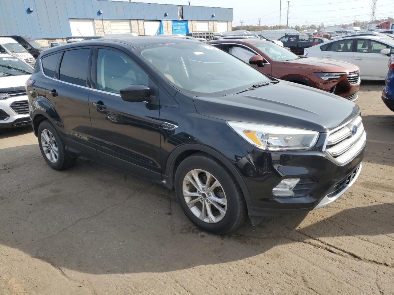 VIN 1FMCU0GDXHUA38328 2017 FORD ESCAPE no.4