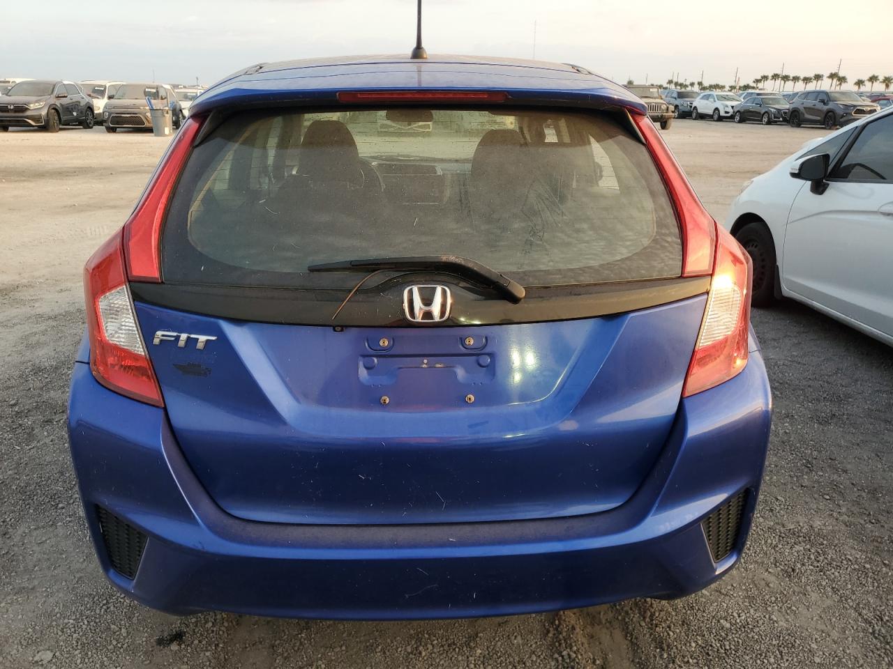 2016 Honda Fit Lx VIN: JHMGK5H54GX008284 Lot: 76003384