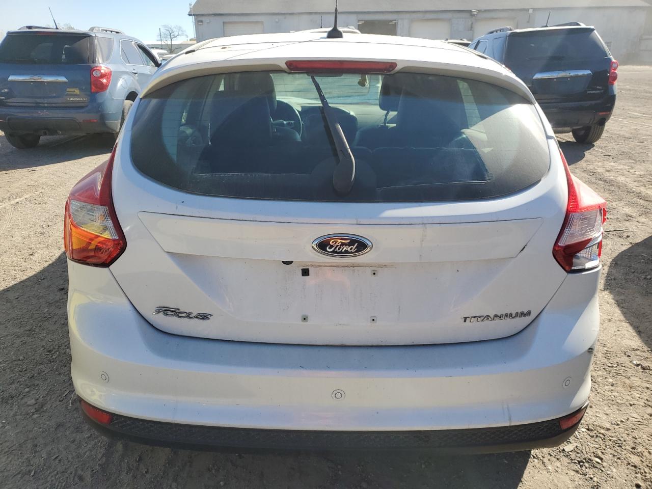 2012 Ford Focus Titanium VIN: 1FAHP3N24CL183230 Lot: 74274264