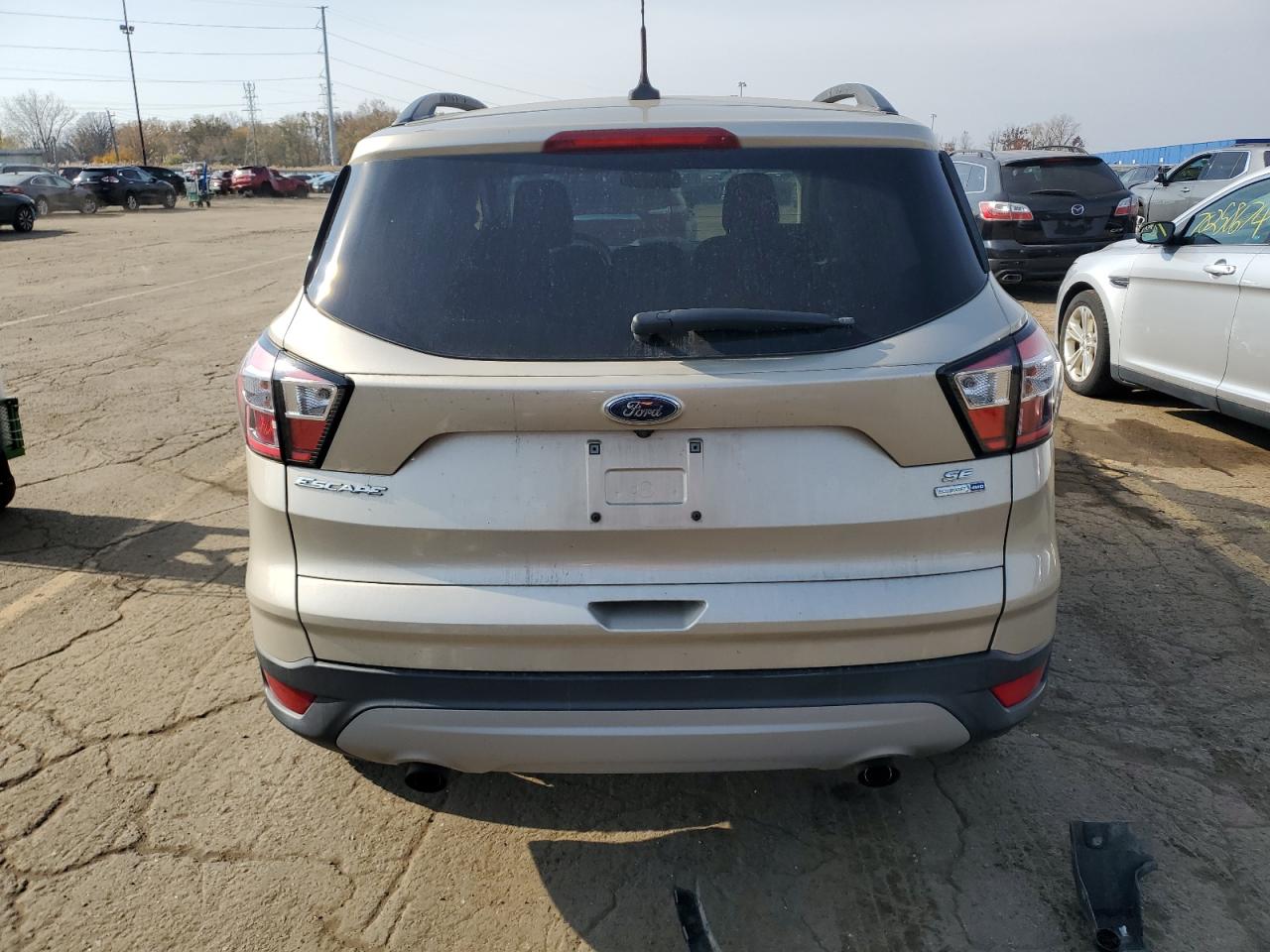 2018 Ford Escape Se VIN: 1FMCU9GD1JUC57799 Lot: 77302404