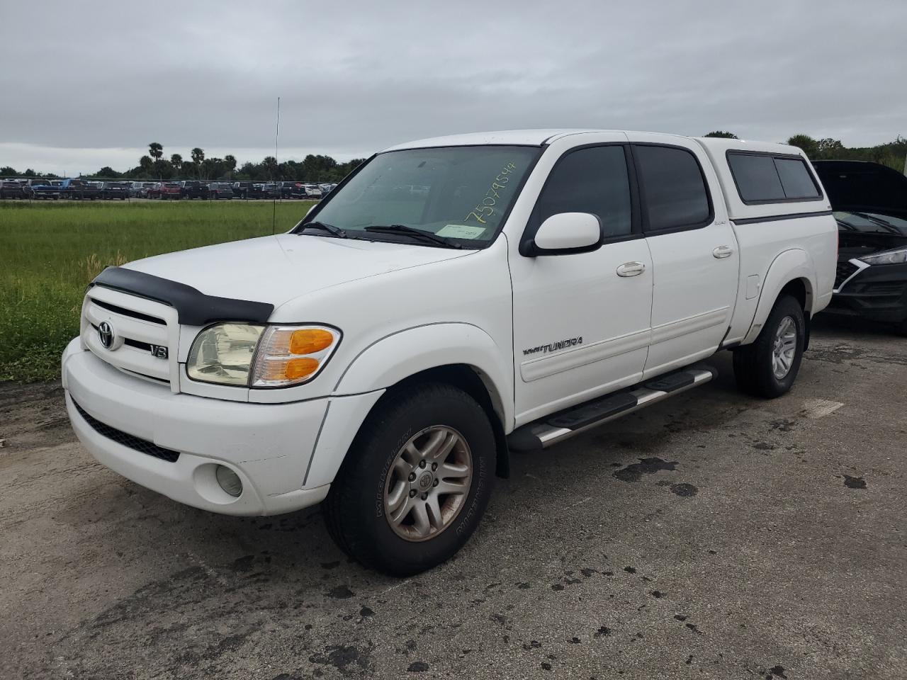 2004 Toyota Tundra Double Cab Limited VIN: 5TBET38124S455102 Lot: 75079544