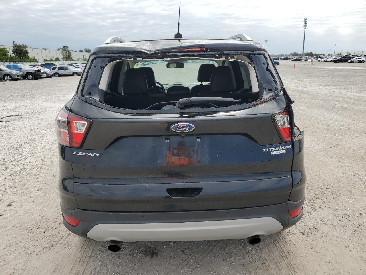 2017 Ford Escape Titanium VIN: 1FMCU0JD0HUB05933 Lot: 76254904