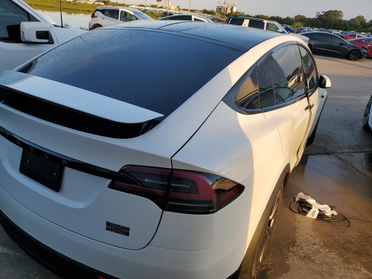 2023 Tesla Model X VIN: 7SAXCBE66PF404255 Lot: 74948344