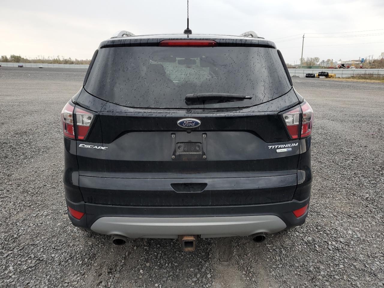 2017 Ford Escape Titanium VIN: 1FMCU9J9XHUD69273 Lot: 77410694