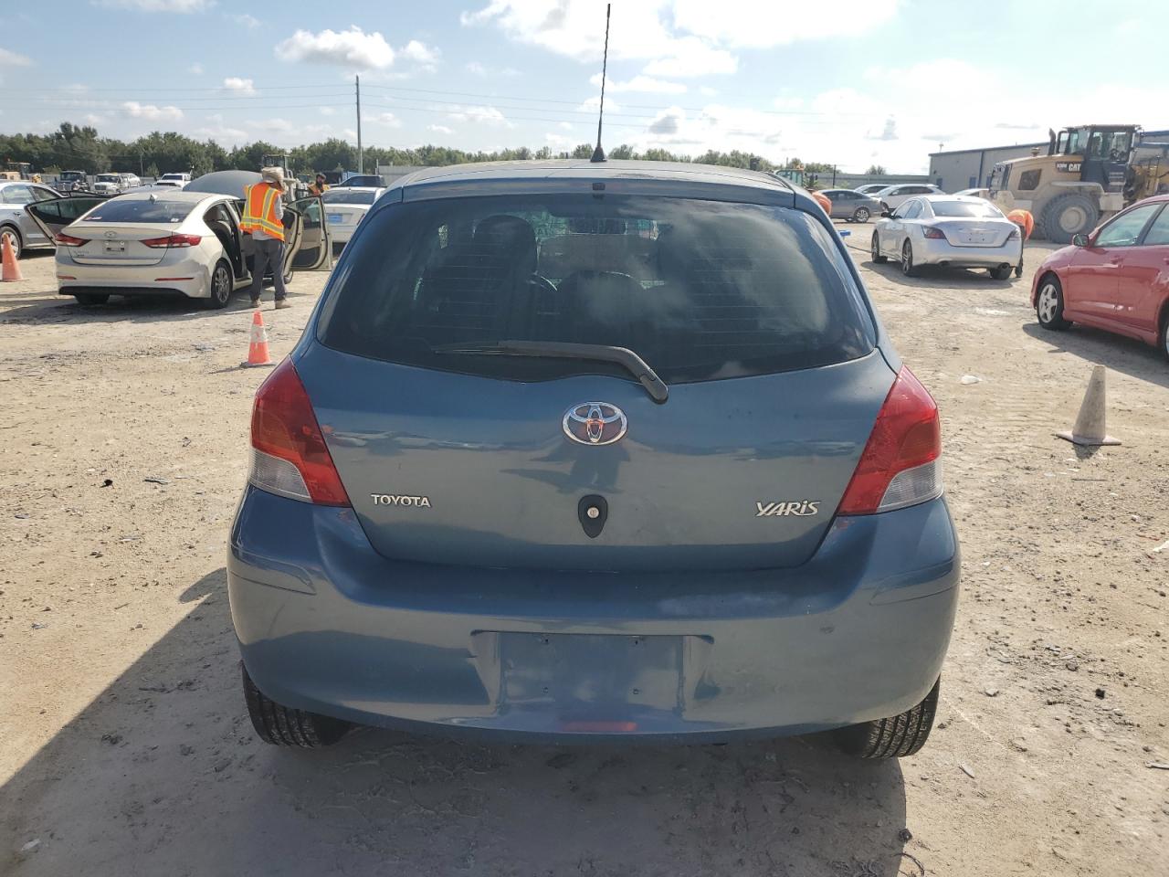 2009 Toyota Yaris VIN: JTDJT903395222607 Lot: 74183214