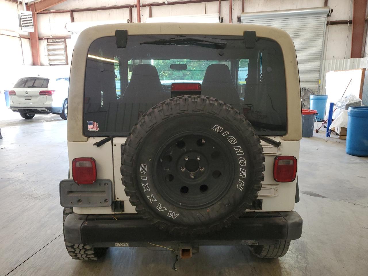 2000 Jeep Wrangler / Tj Sport VIN: 1J4FA49S7YP760491 Lot: 75870584