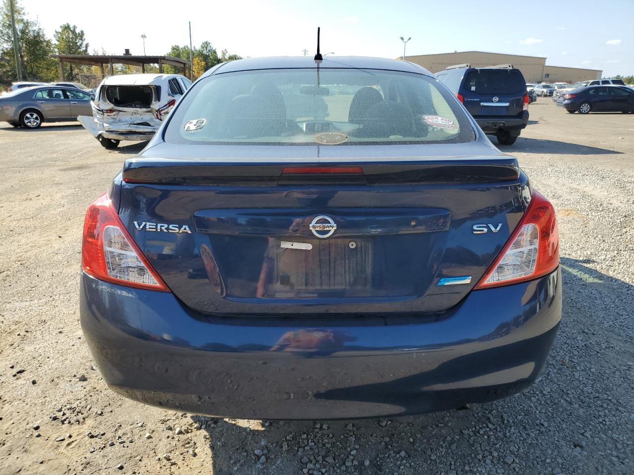 2013 Nissan Versa S VIN: 3N1CN7AP7DL889409 Lot: 77620664