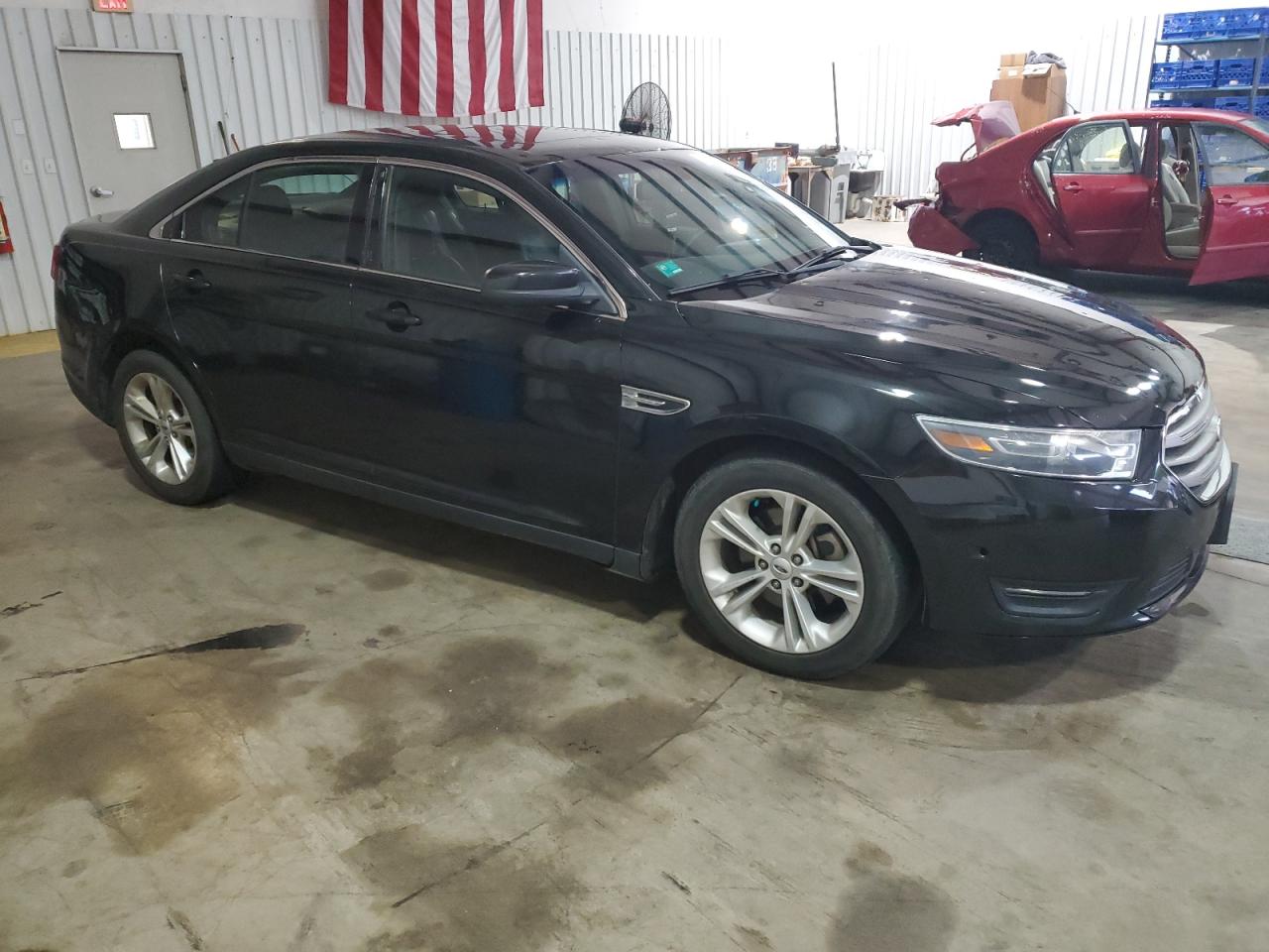 VIN 1FAHP2E84FG189945 2015 FORD TAURUS no.4