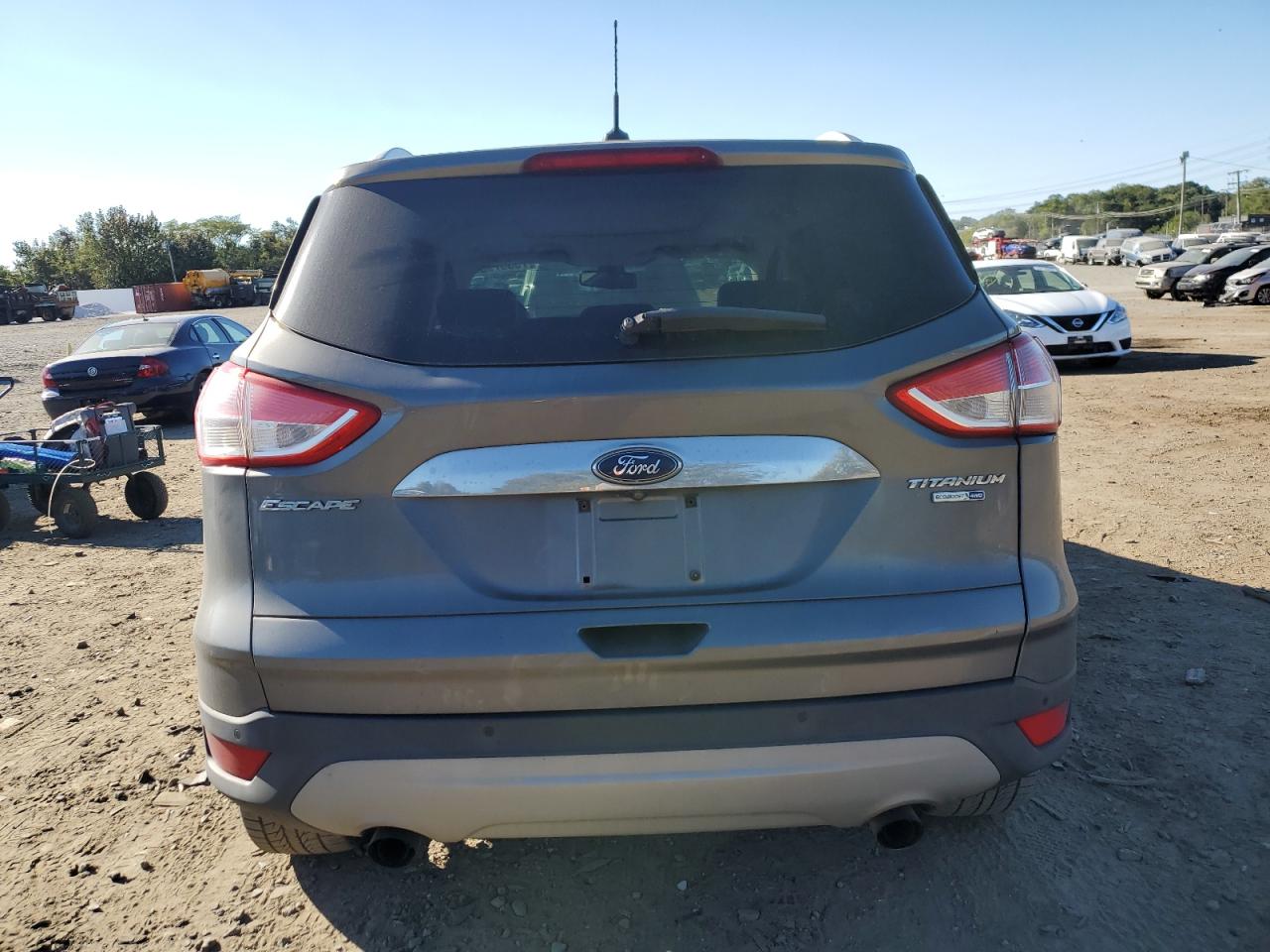 2014 Ford Escape Titanium VIN: 1FMCU9J90EUD60092 Lot: 75537934