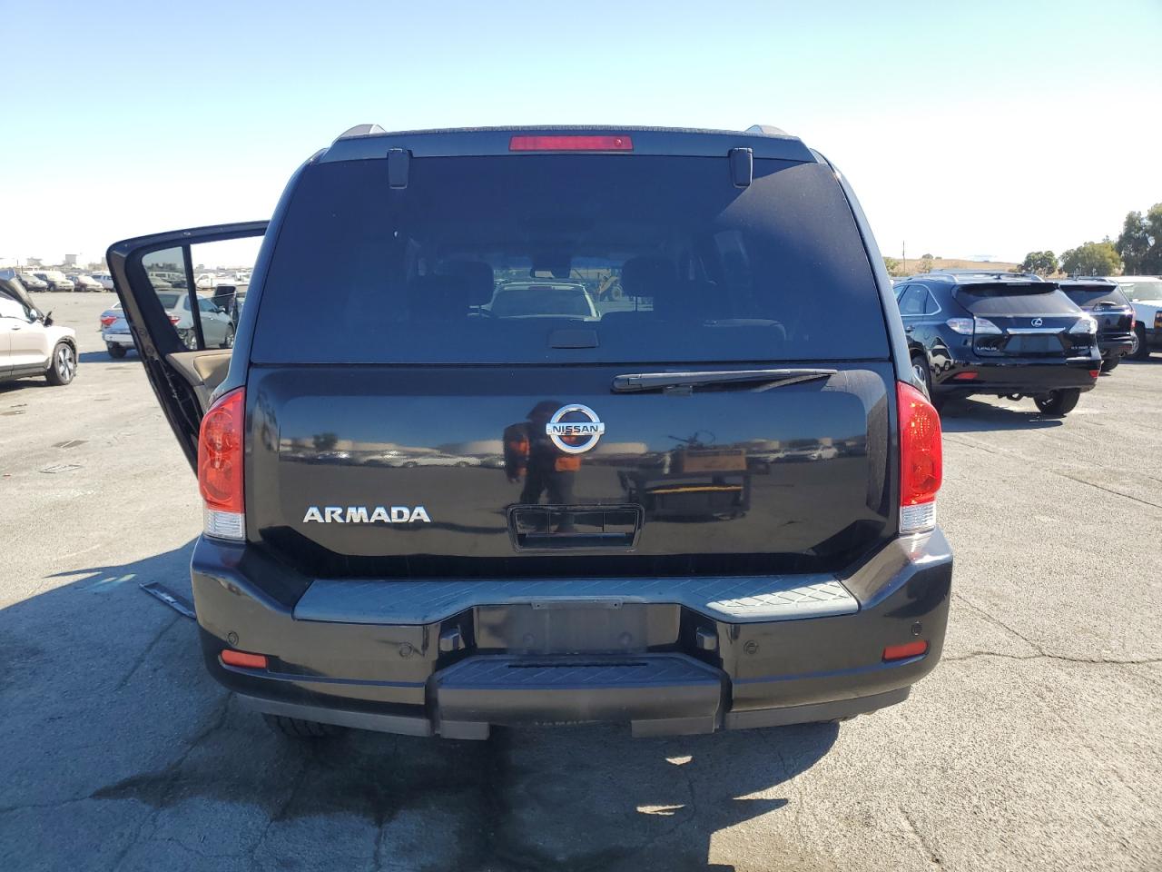 2011 Nissan Armada Sv VIN: 5N1AA0ND5BN624231 Lot: 76145374