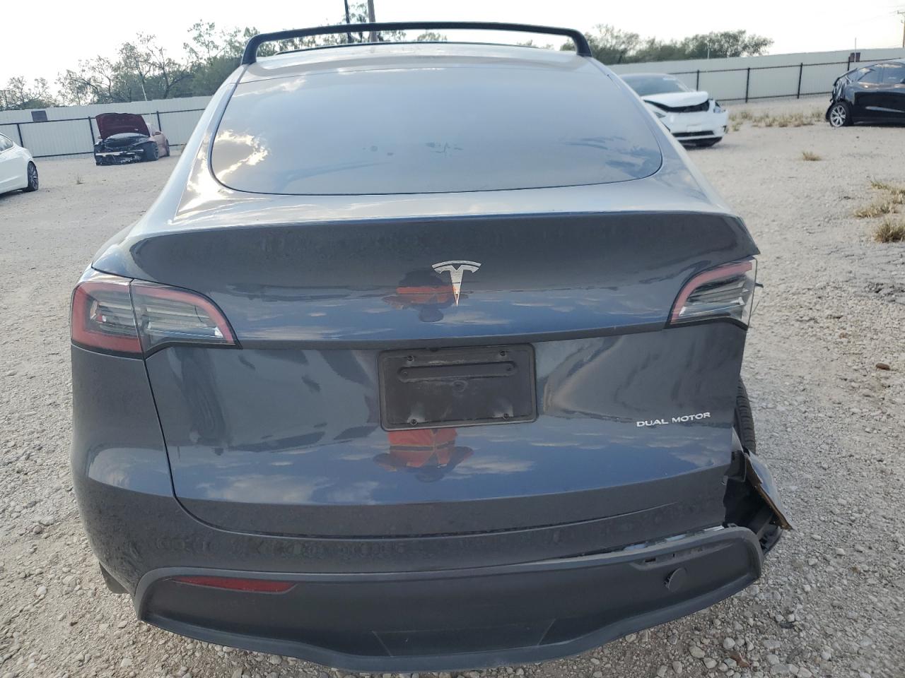 2023 Tesla Model Y VIN: 7SAYGAEEXPF882902 Lot: 74390484