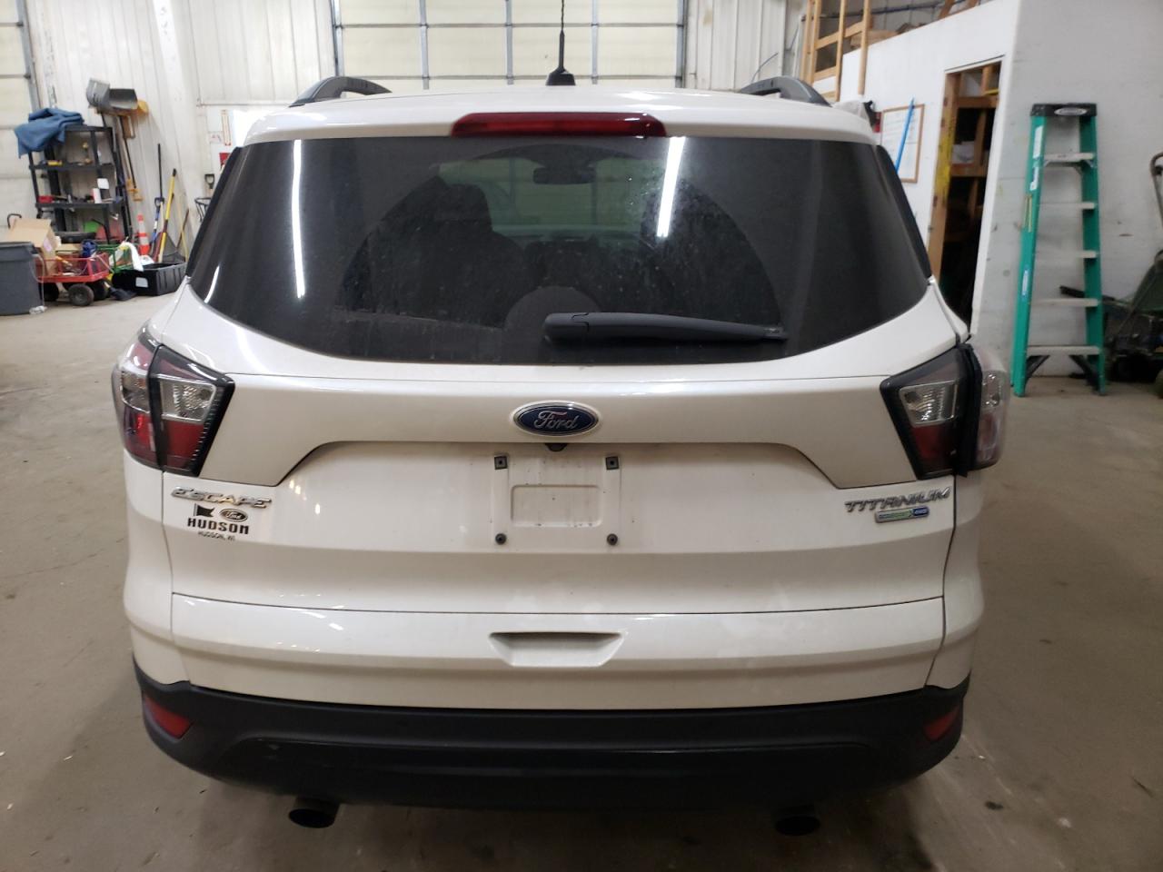 2017 Ford Escape Titanium VIN: 1FMCU9J91HUA38999 Lot: 77559354