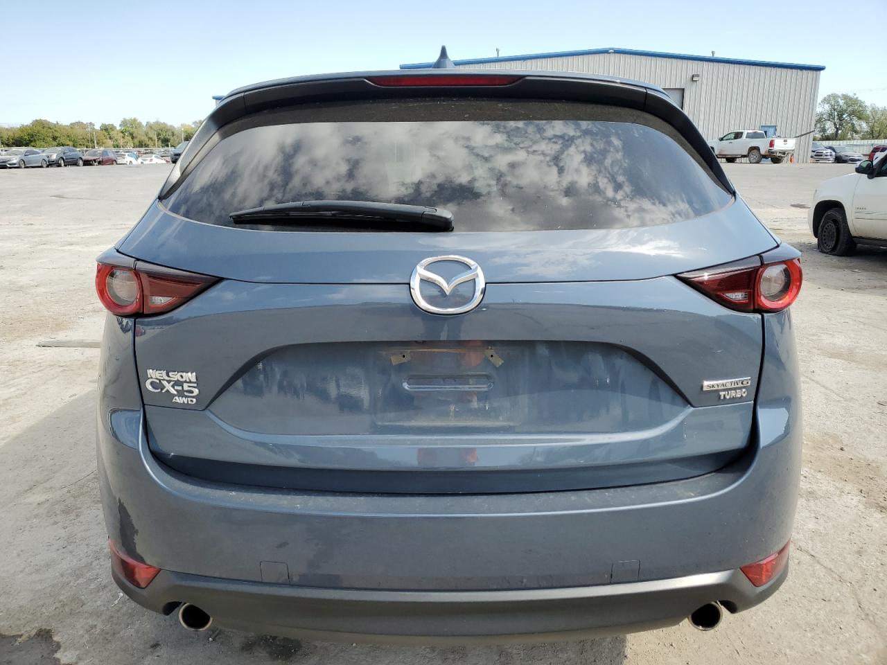 2021 Mazda Cx-5 Carbon Edition VIN: JM3KFBCY3M0395146 Lot: 75544184