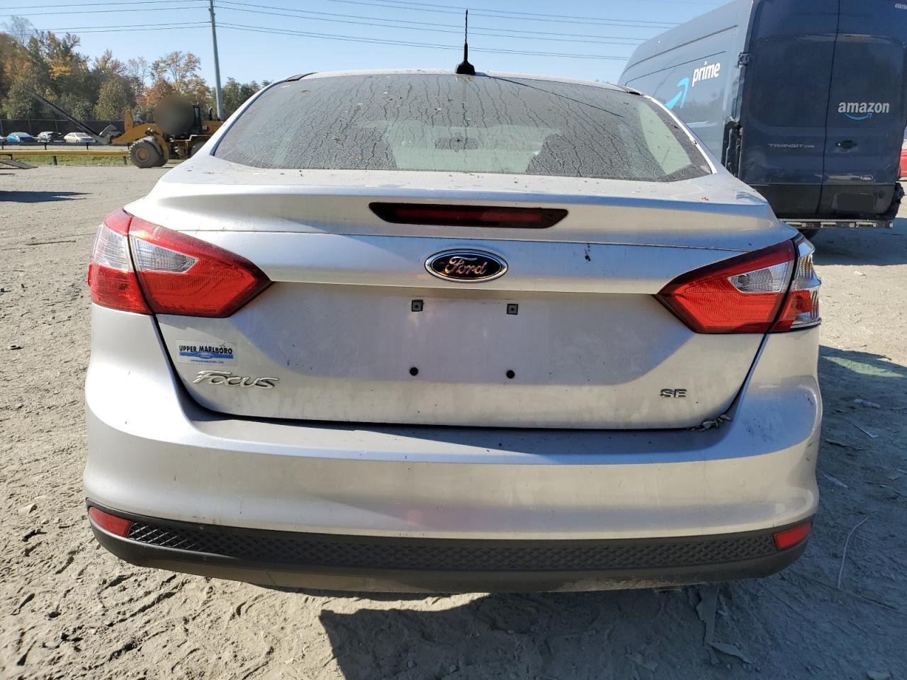 2014 Ford Focus Se VIN: 1FADP3F27EL285749 Lot: 77710474