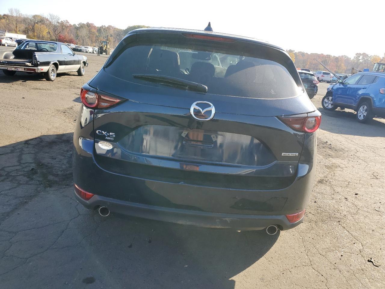 2021 Mazda Cx-5 Touring VIN: JM3KFBCM1M1472197 Lot: 76338184