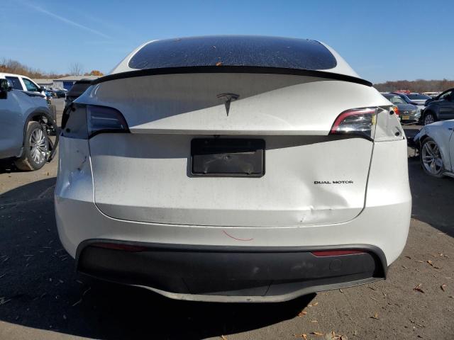 7SAYGDEEXPA052211 Tesla Model Y  6