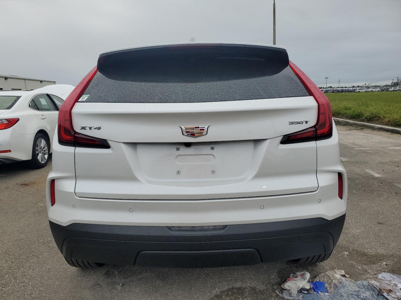 2024 Cadillac Xt4 Luxury VIN: 1GYAZAR40RF229076 Lot: 75119004