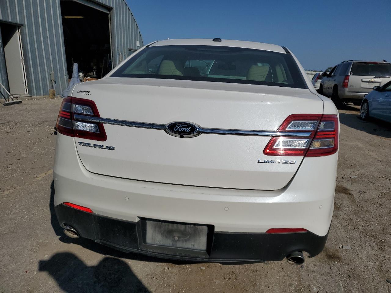 2016 Ford Taurus Limited VIN: 1FAHP2F88GG104542 Lot: 75475544