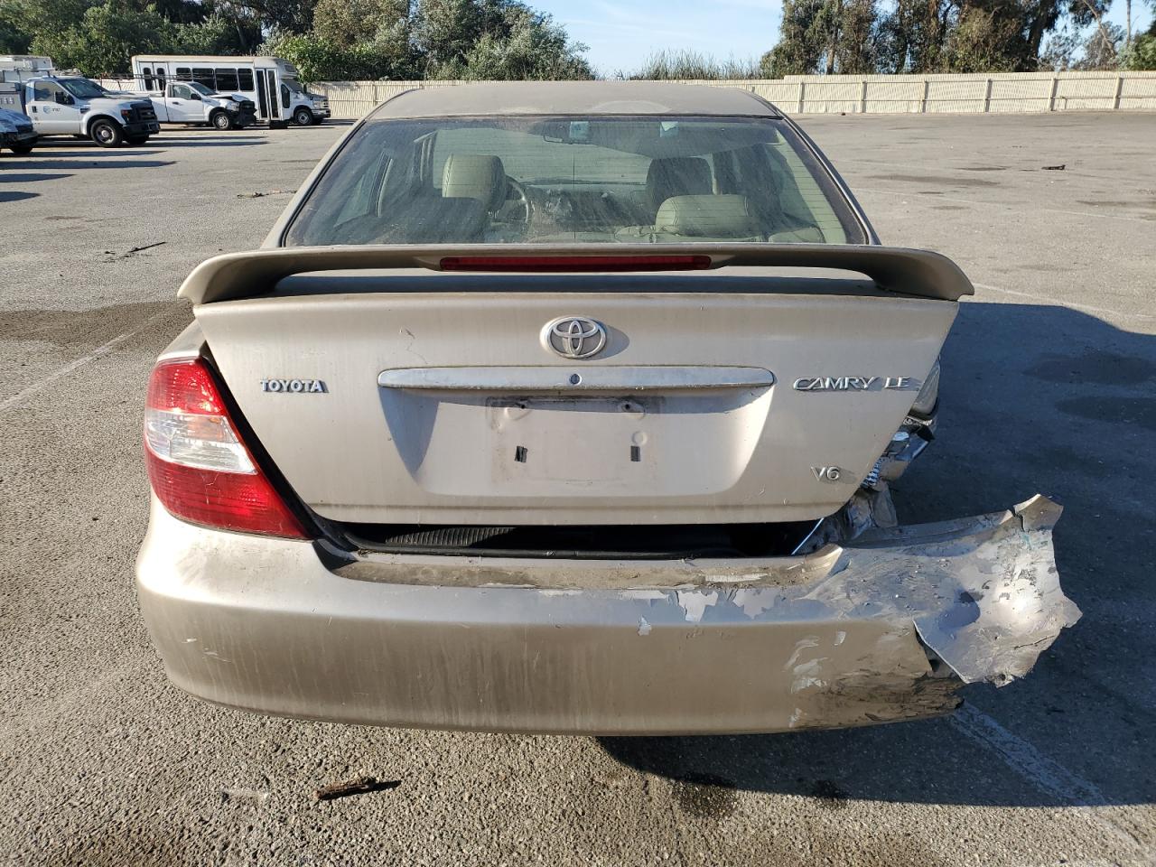 2004 Toyota Camry Le VIN: 4T1BF30K54U570306 Lot: 77150704