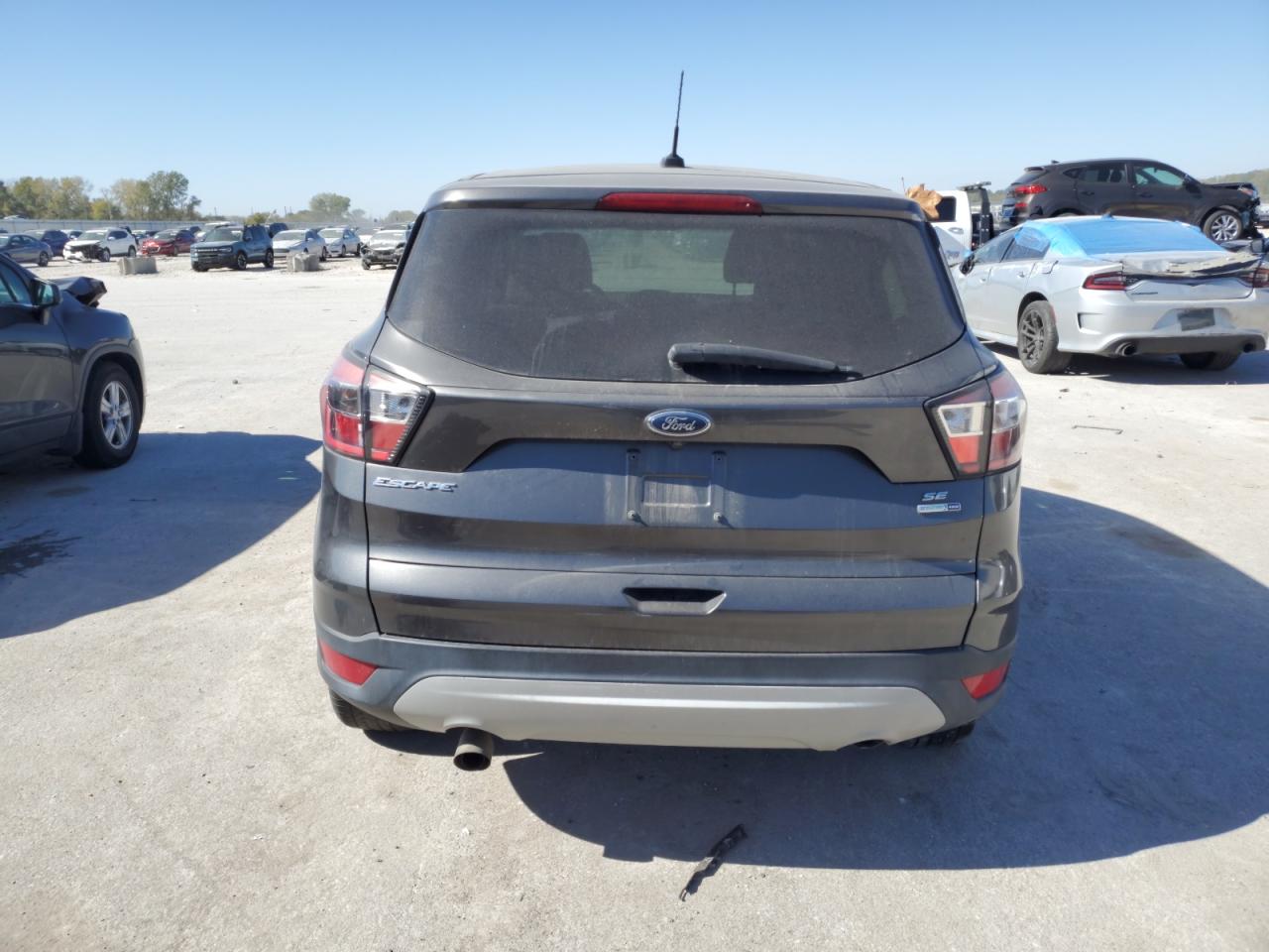 2017 Ford Escape Se VIN: 1FMCU9G98HUA71487 Lot: 76002384