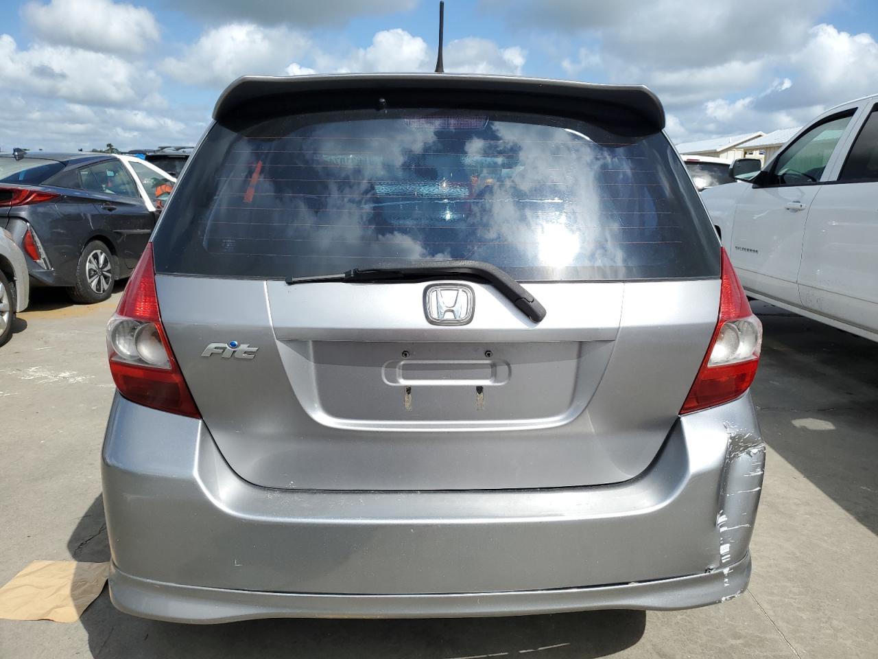 2007 Honda Fit S VIN: JHMGD38637S002366 Lot: 75031074