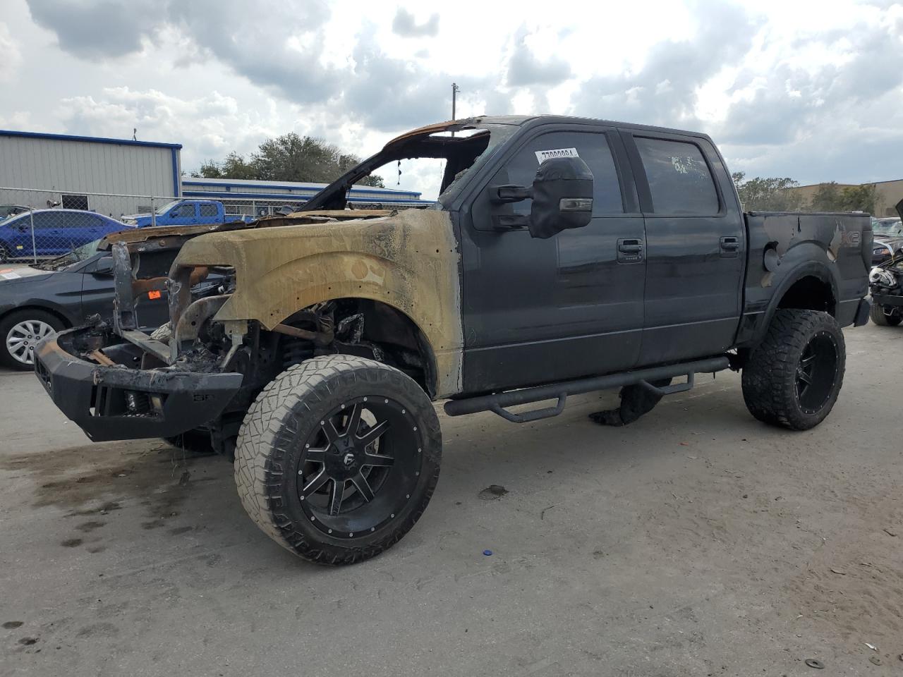 2013 Ford F150 Supercrew იყიდება Orlando-ში, FL - Burn