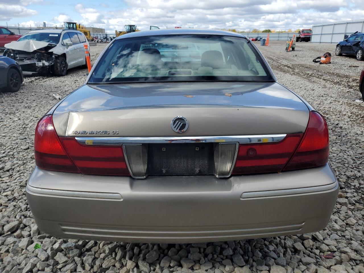 2004 Mercury Grand Marquis Gs VIN: 2MEFM74W44X659047 Lot: 75977484