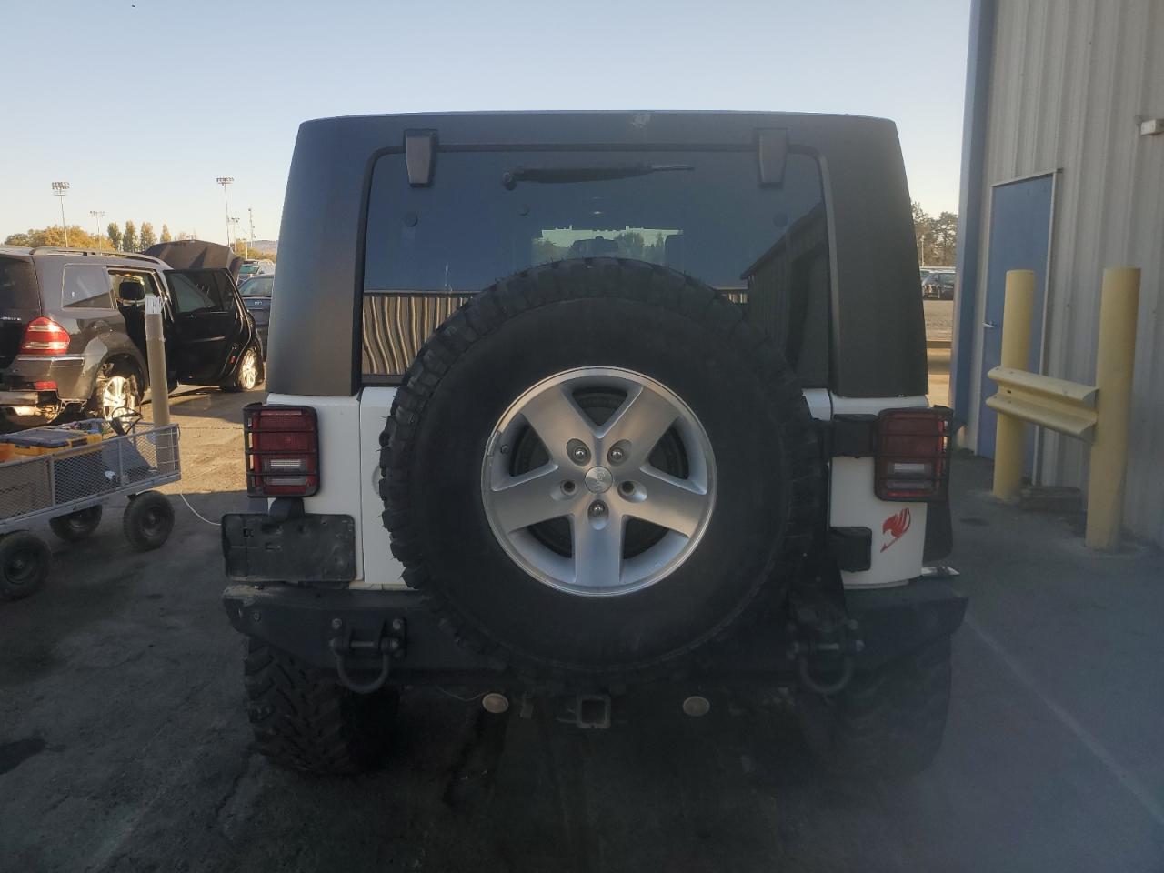 2009 Jeep Wrangler Unlimited Rubicon VIN: 1J4GA69129L778574 Lot: 77905624