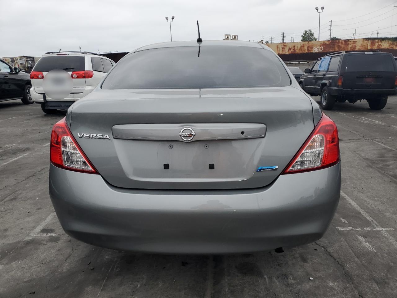 2014 Nissan Versa S VIN: 3N1CN7AP2EL842564 Lot: 75303524