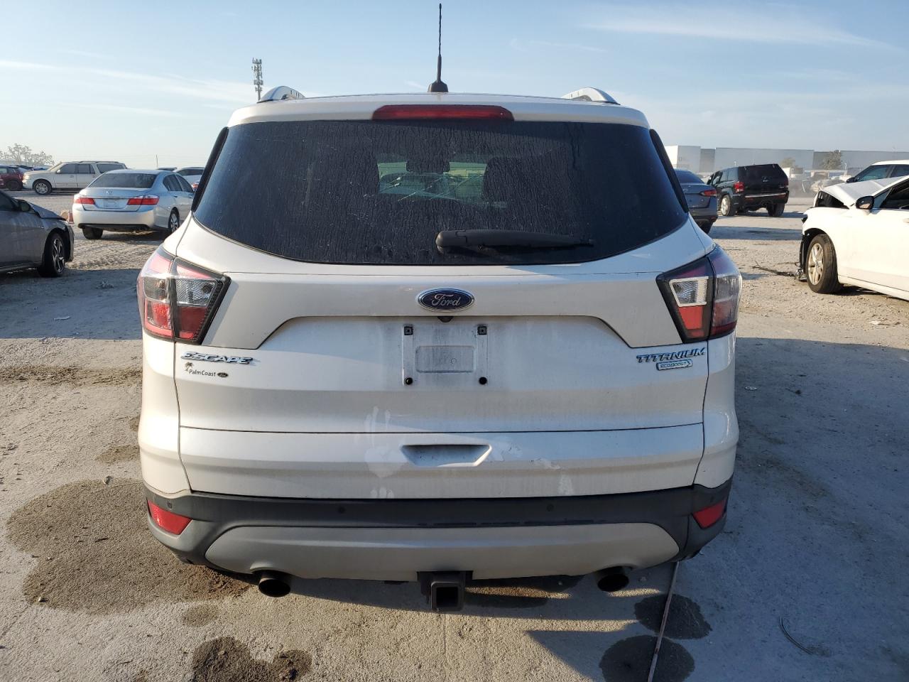 2017 Ford Escape Titanium VIN: 1FMCU0J97HUA09843 Lot: 77698524