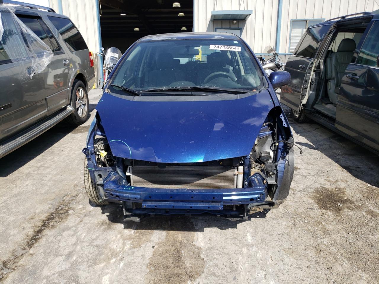 2012 Honda Fit VIN: JHMGE8H3XCC035451 Lot: 74748554